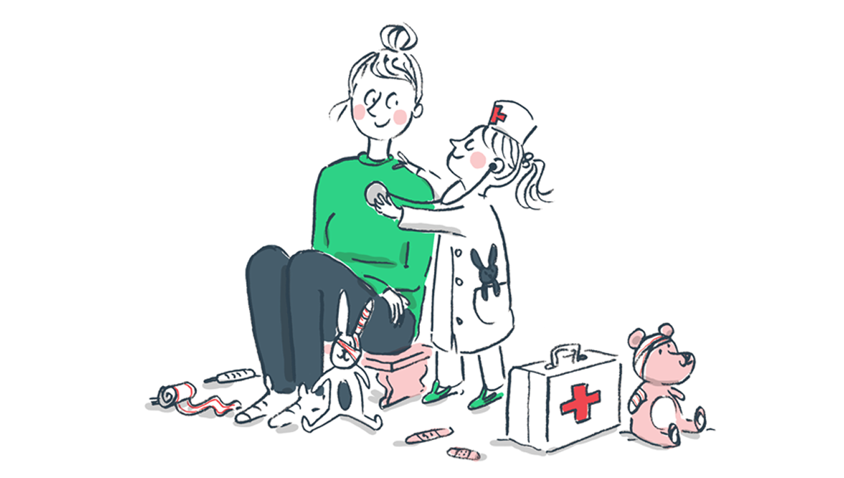 A babysitter sits on the floor while a child dressed in a doctor costume examines her, with a toy medical kit and teddy bear nearby.